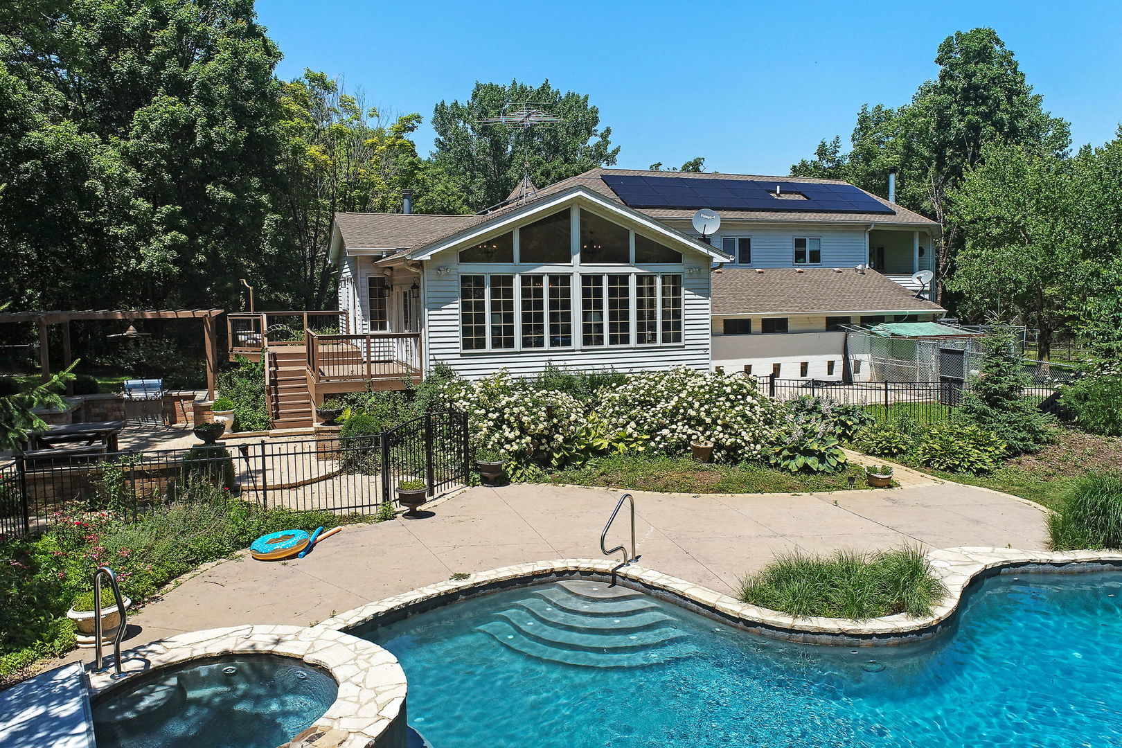 4602 Sunnyside Road Woodstock, IL 60098 - Photo 44 of 73 a view of a house with backyard and sitting area