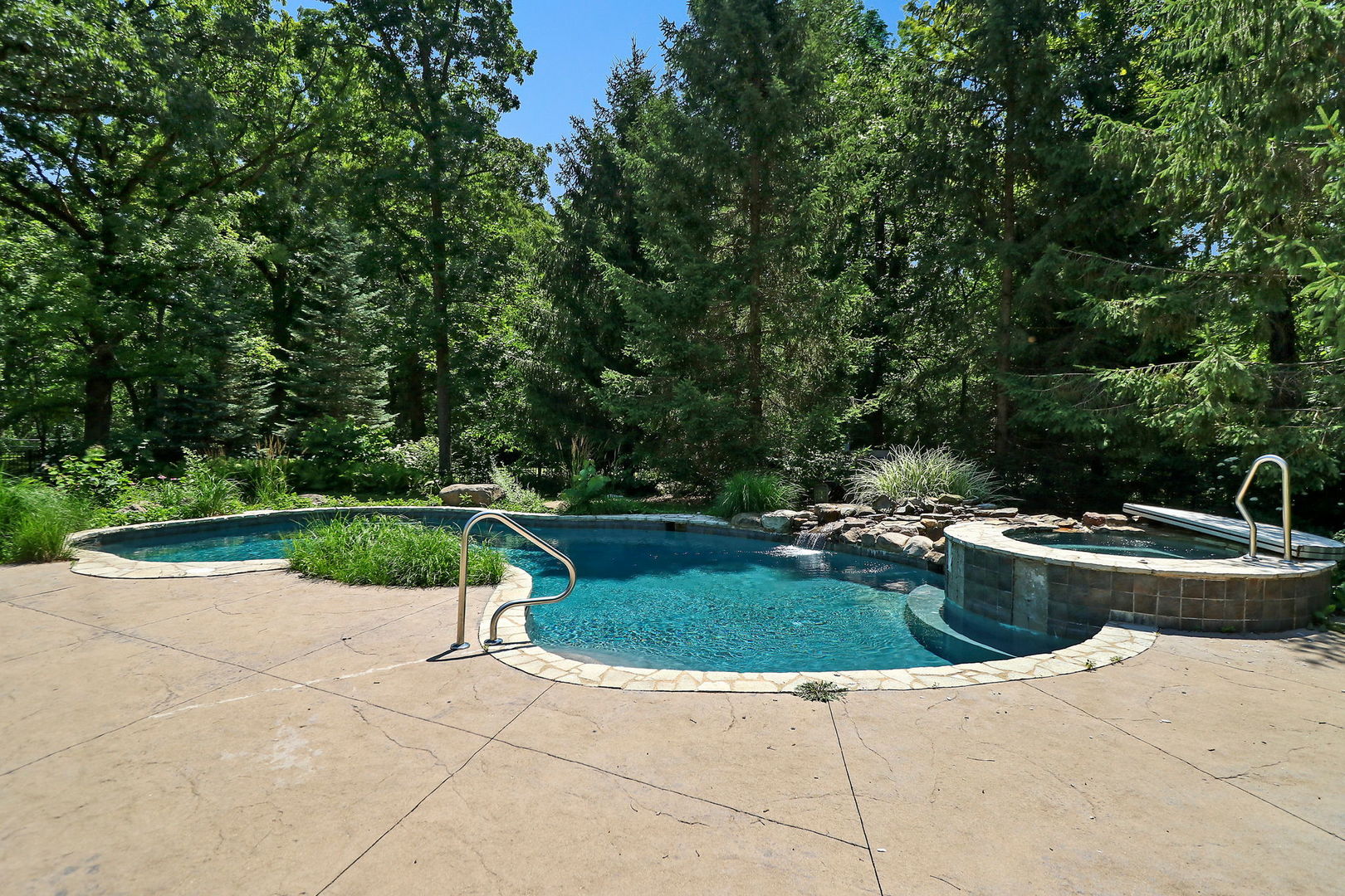 4602 Sunnyside Road Woodstock, IL 60098 - Photo 46 of 73 a view of a backyard with swimming pool