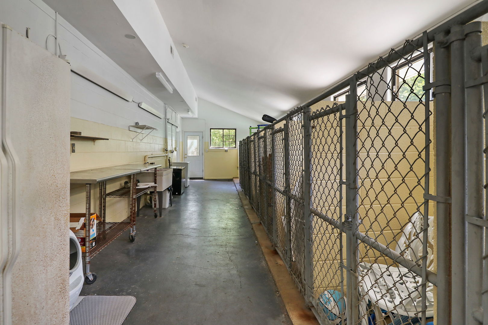 4602 Sunnyside Road Woodstock, IL 60098 - Photo 49 of 73 a hallway with wooden floor stairs and furniture