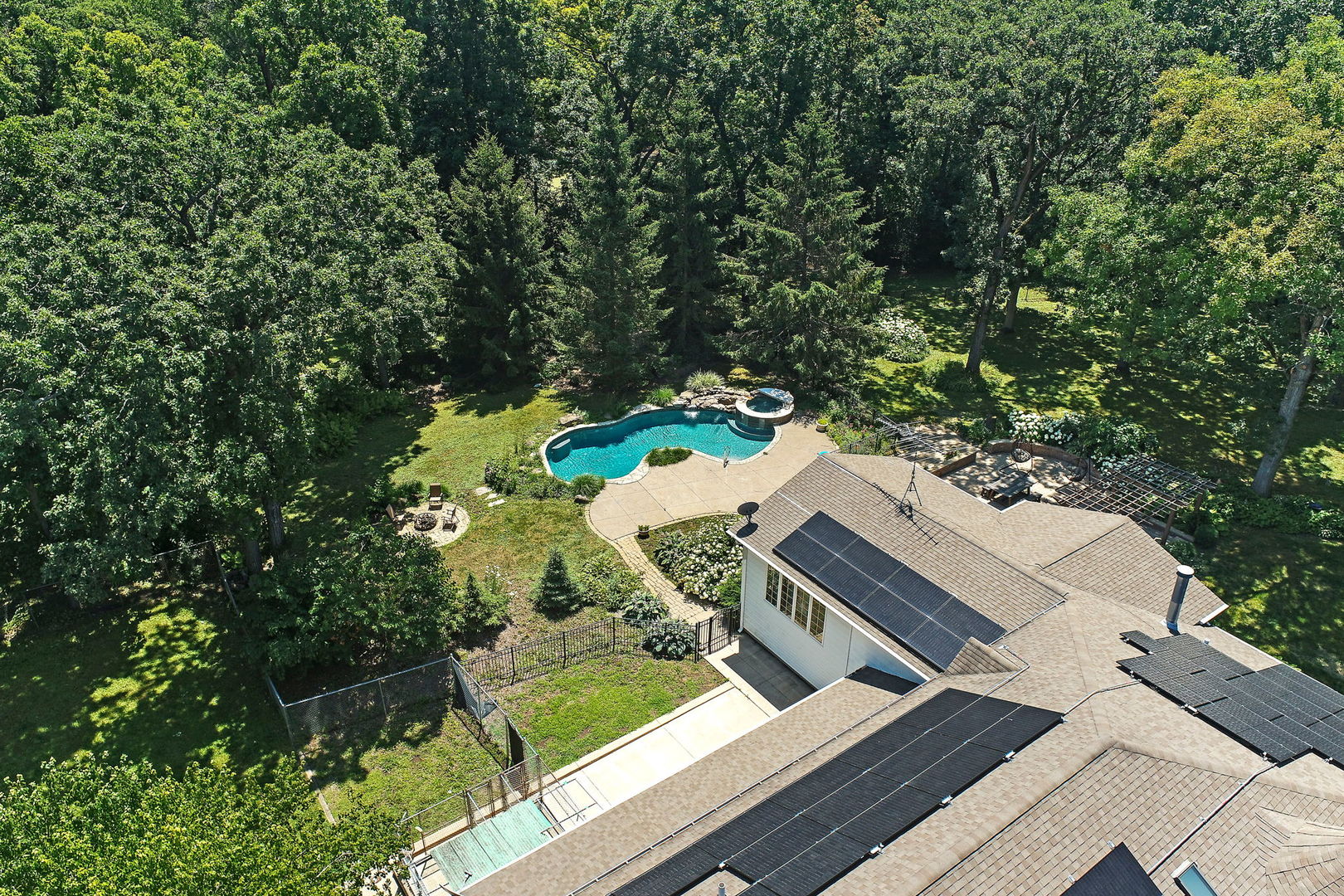 4602 Sunnyside Road Woodstock, IL 60098 - Photo 58 of 73 a view of a yard with chairs