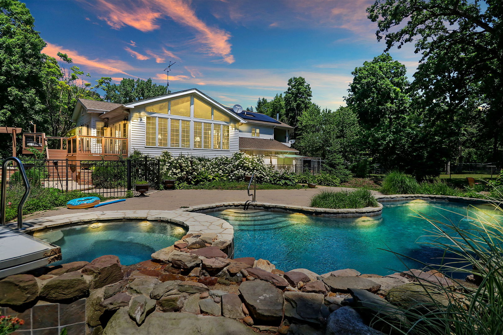 4602 Sunnyside Road Woodstock, IL 60098 - Photo 69 of 73 a view of a house with swimming pool and a yard