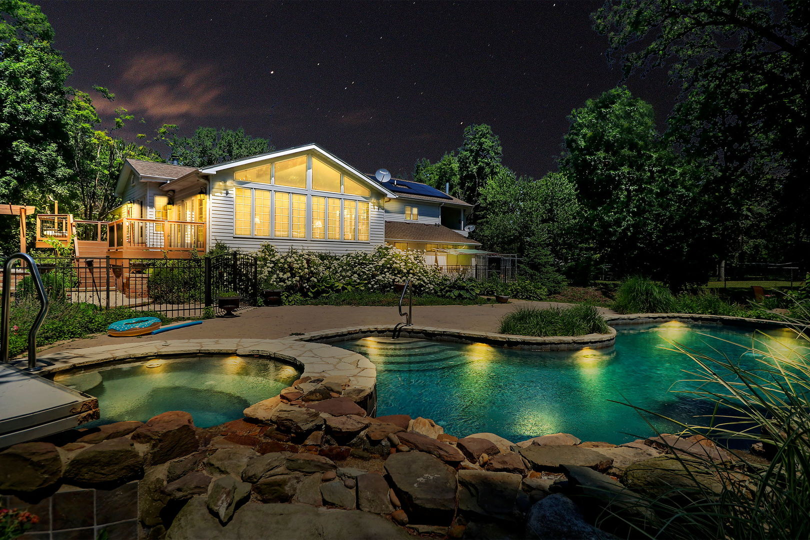4602 Sunnyside Road Woodstock, IL 60098 - Photo 70 of 73 a view of a swimming pool with a lake view