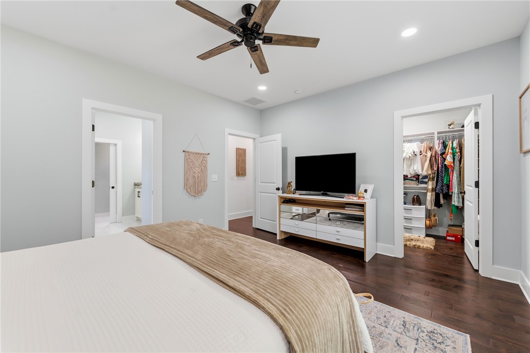 502 Canebrake Drive Anderson, SC 29621 - Photo 19 of 39 This primary bedroom features elegant wood flooring and a spacious walk-in closet for ample storage.