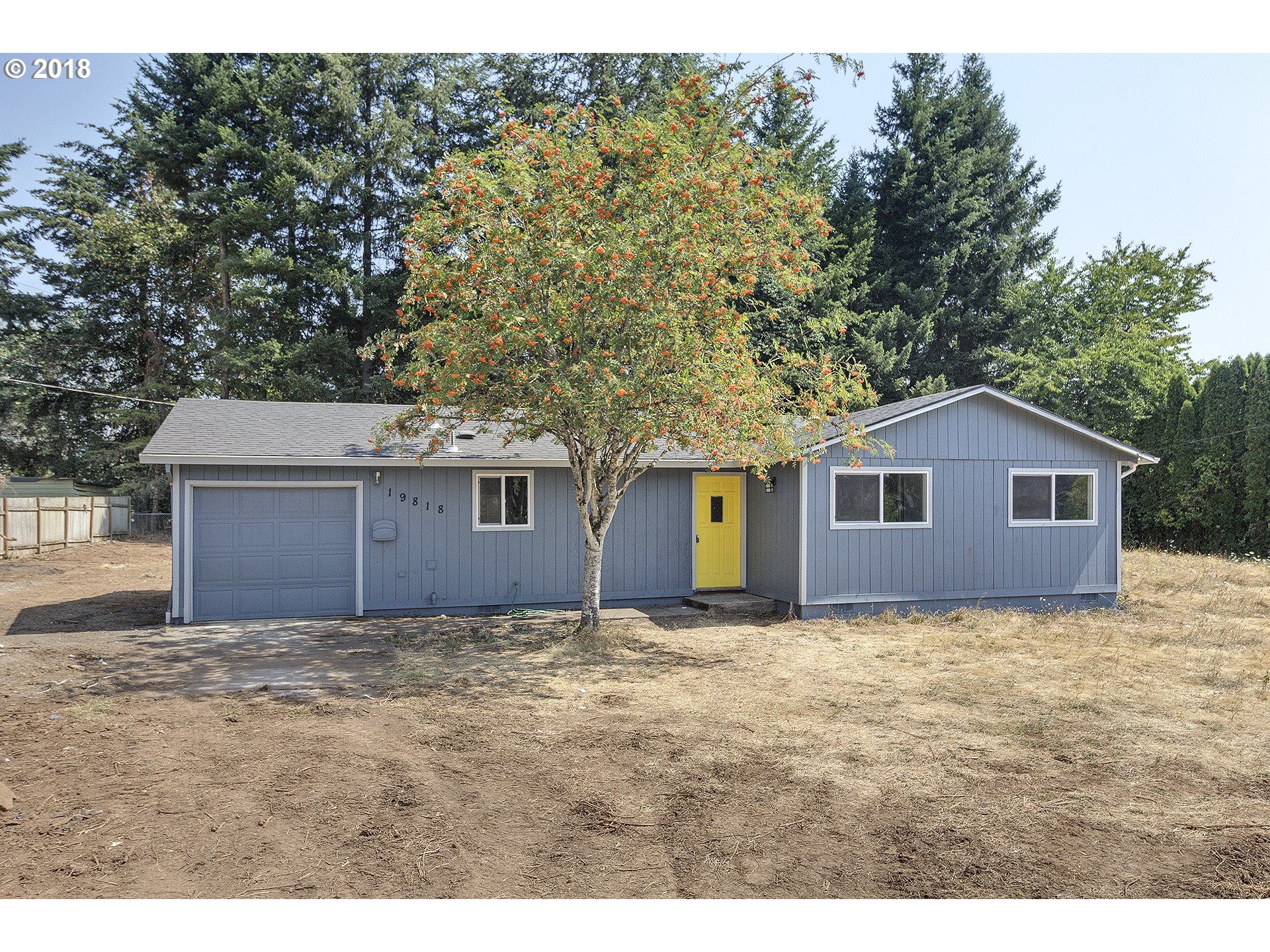 19818 Leland Road Oregon City, OR 97045 - Photo 1 of 11 a view of a house with a yard
