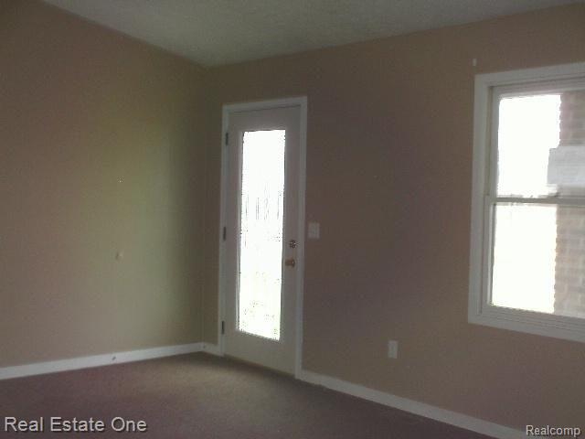 3125 North Nicholson Road Fowlerville, MI 48836 - Photo 12 of 14 3125 N Nicholson Front Entry