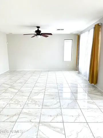 a kitchen with stainless steel appliances kitchen island granite countertop a sink and cabinets