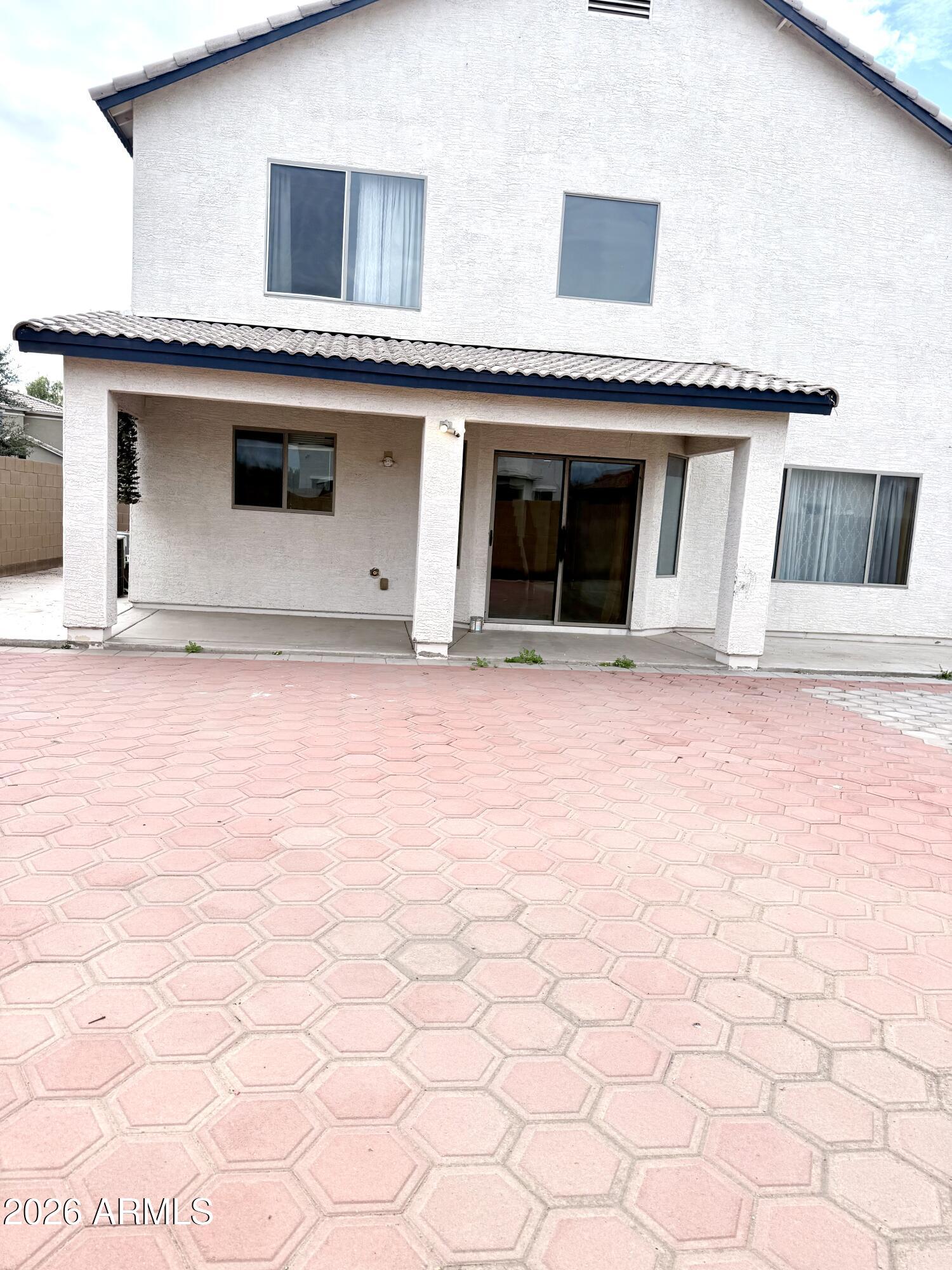 2326 West Gaby Road Phoenix, AZ 85041 - Photo 70 of 75 a front view of a house with a yard