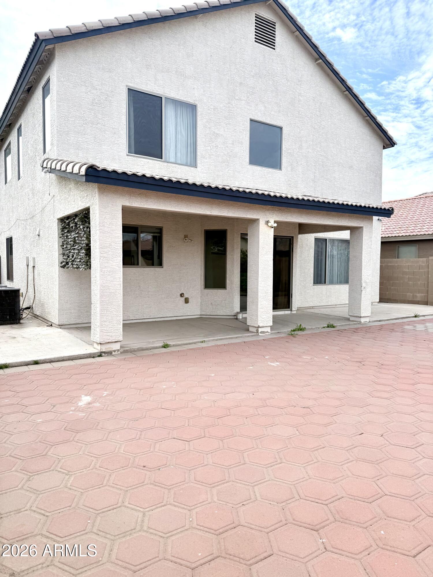 2326 West Gaby Road Phoenix, AZ 85041 - Photo 73 of 75 a front view of a house with yard