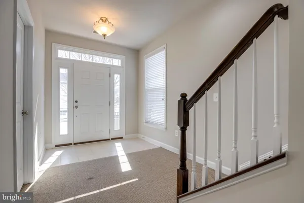 a view of a hallway with entryway