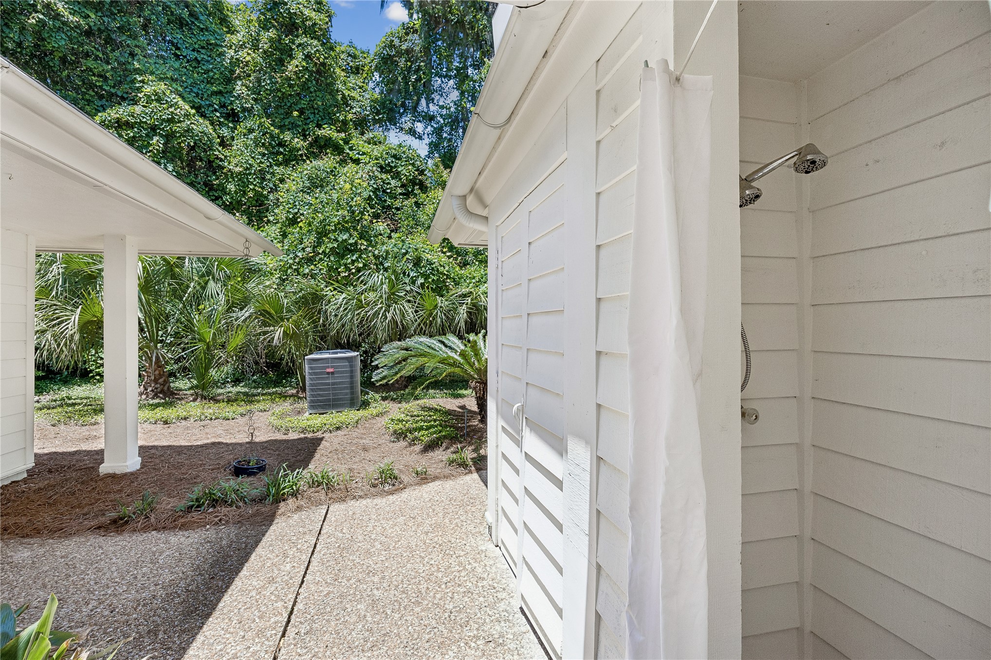 123 Bitternut Road Fernandina Beach, FL 32034 - Photo 57 of 87 Outdoor shower is perfect for showering off after a day at the beach! Could also be a good pet bathing area.