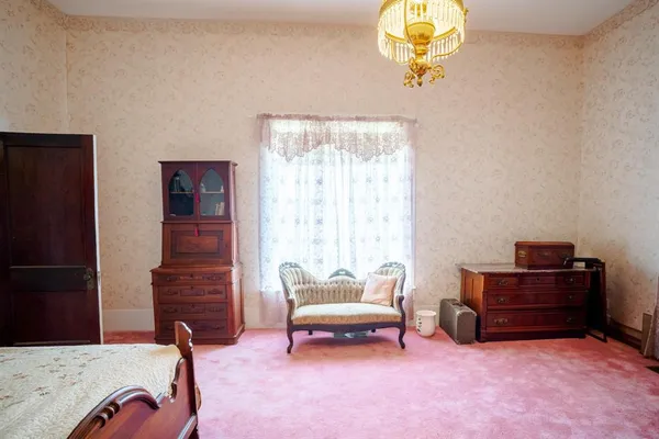 a living room with furniture and a table