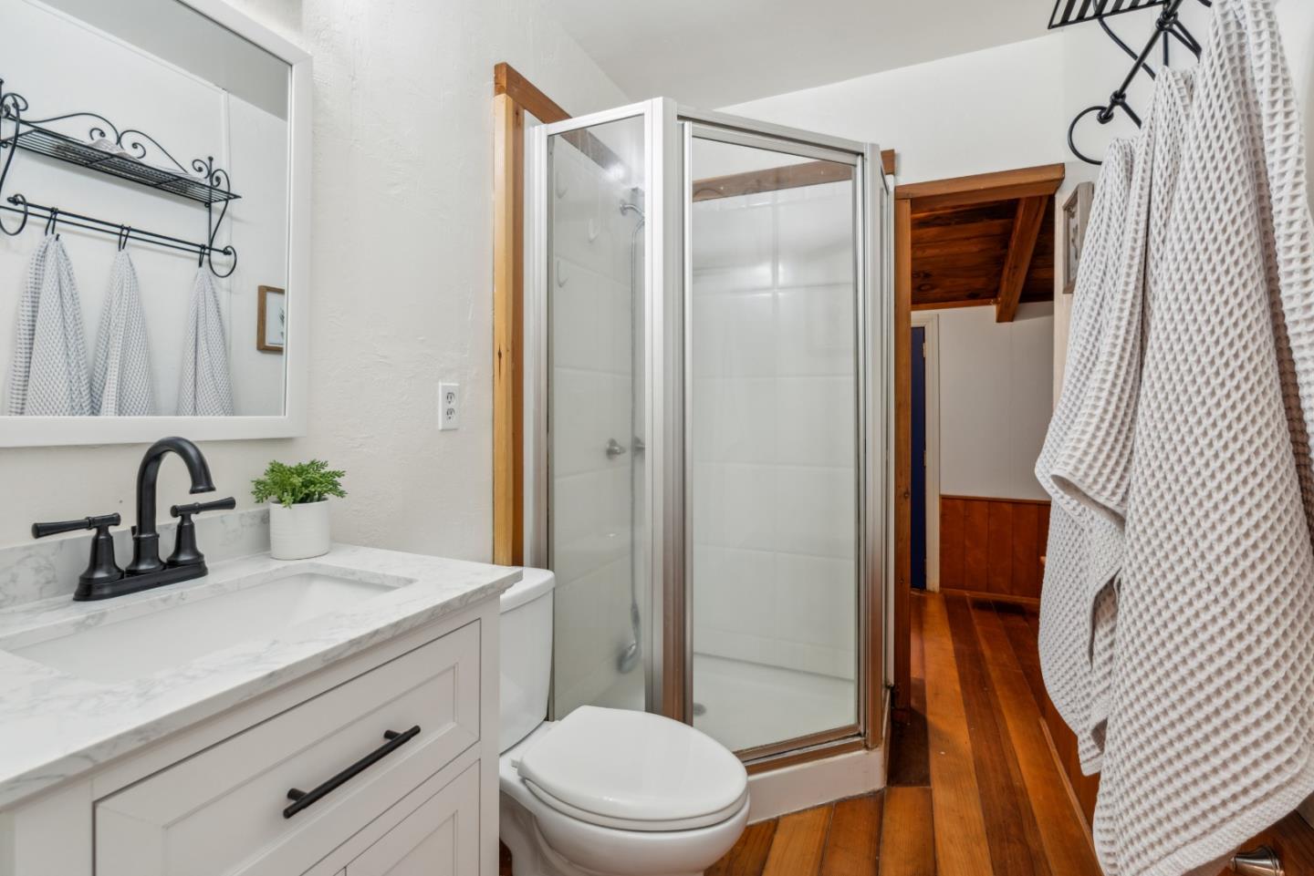 805 Fanning Grde Ben Lomond, CA 95005 - Photo 16 of 60 a bathroom with a sink a toilet and shower