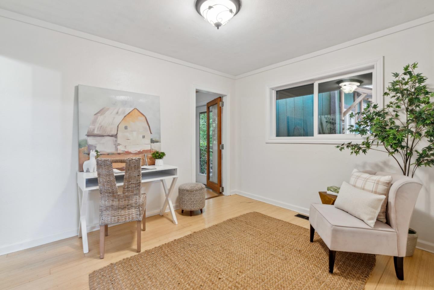 805 Fanning Grde Ben Lomond, CA 95005 - Photo 18 of 60 a living room with furniture a window and a potted plant