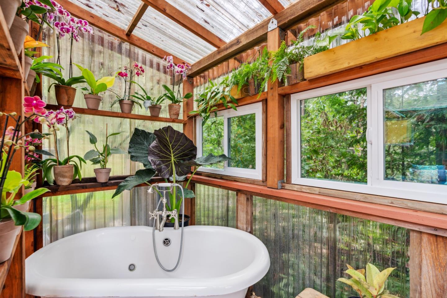 805 Fanning Grde Ben Lomond, CA 95005 - Photo 30 of 60 a bathroom with a sink and a large mirror