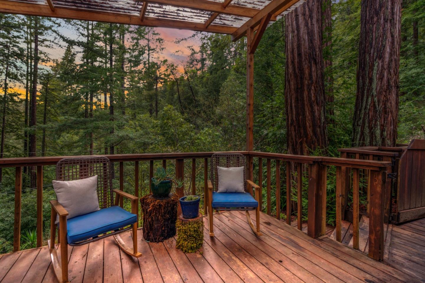 805 Fanning Grde Ben Lomond, CA 95005 - Photo 3 of 60 a view of a balcony with wooden floor and outdoor seating