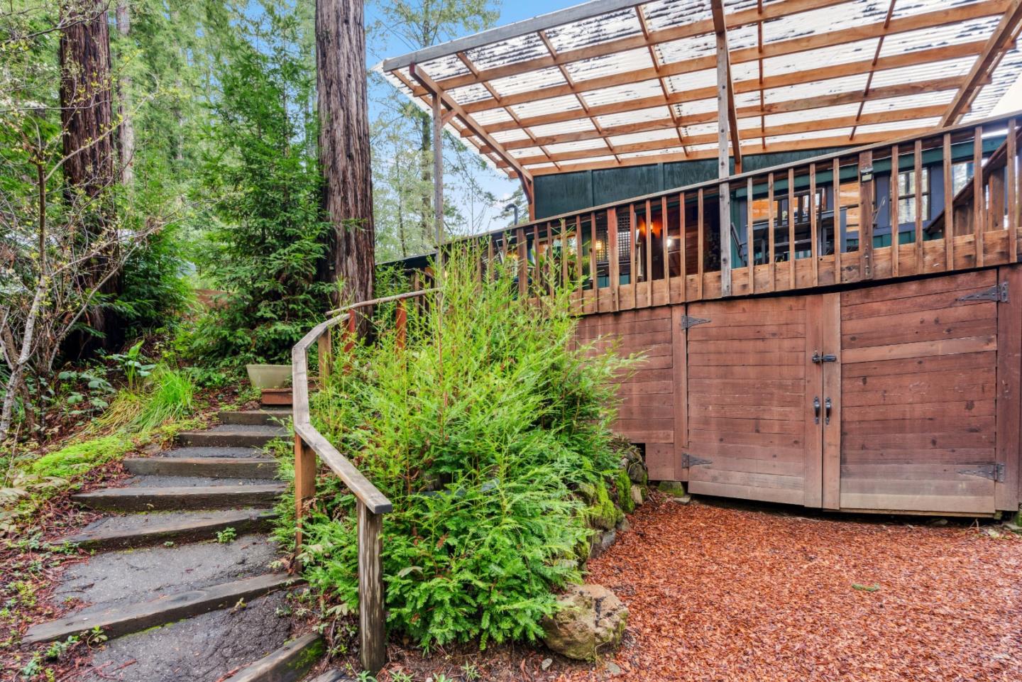 805 Fanning Grde Ben Lomond, CA 95005 - Photo 34 of 60 a view of a small yard with wooden fence