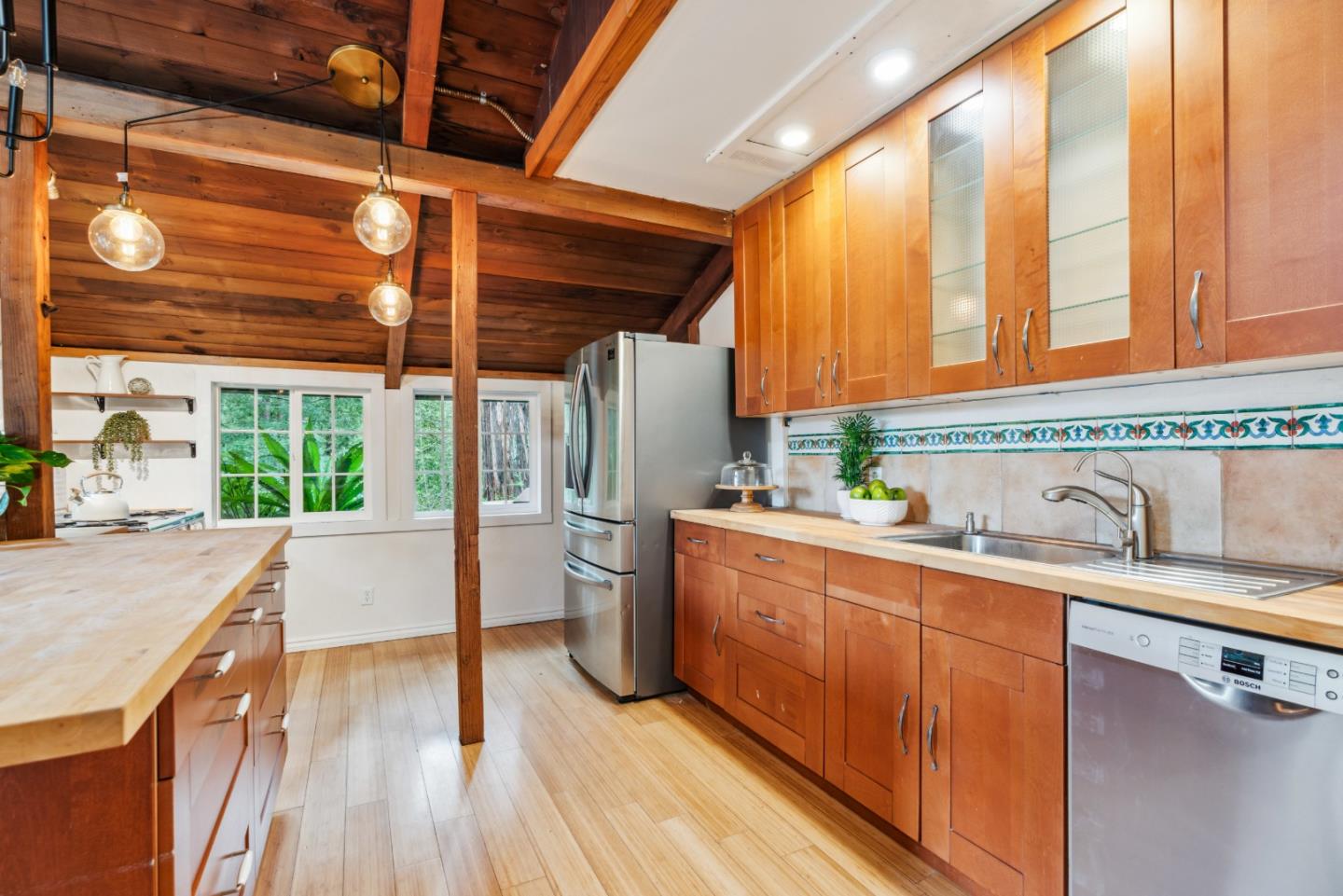 805 Fanning Grde Ben Lomond, CA 95005 - Photo 5 of 60 a kitchen with sink a refrigerator and wooden cabinets