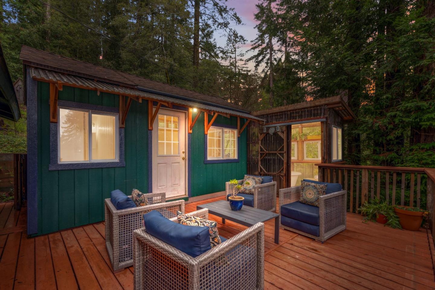805 Fanning Grde Ben Lomond, CA 95005 - Photo 53 of 60 a outdoor space with patio the couches and a dining table with garden view