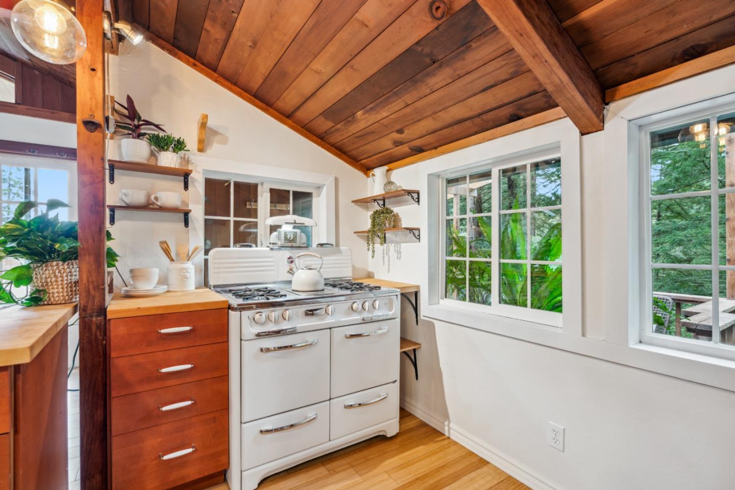 805 Fanning Grde Ben Lomond, CA 95005 - Photo 7 of 60 a kitchen with a stove and a window