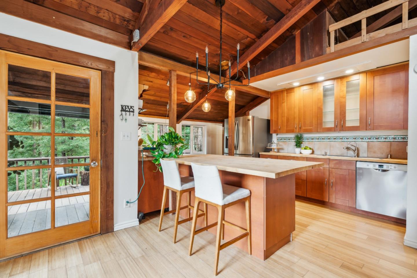805 Fanning Grde Ben Lomond, CA 95005 - Photo 8 of 60 a kitchen with stainless steel appliances granite countertop a stove a sink and a refrigerator