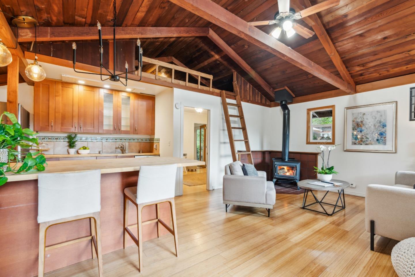 805 Fanning Grde Ben Lomond, CA 95005 - Photo 9 of 60 a living room with couches and a dining table with kitchen view