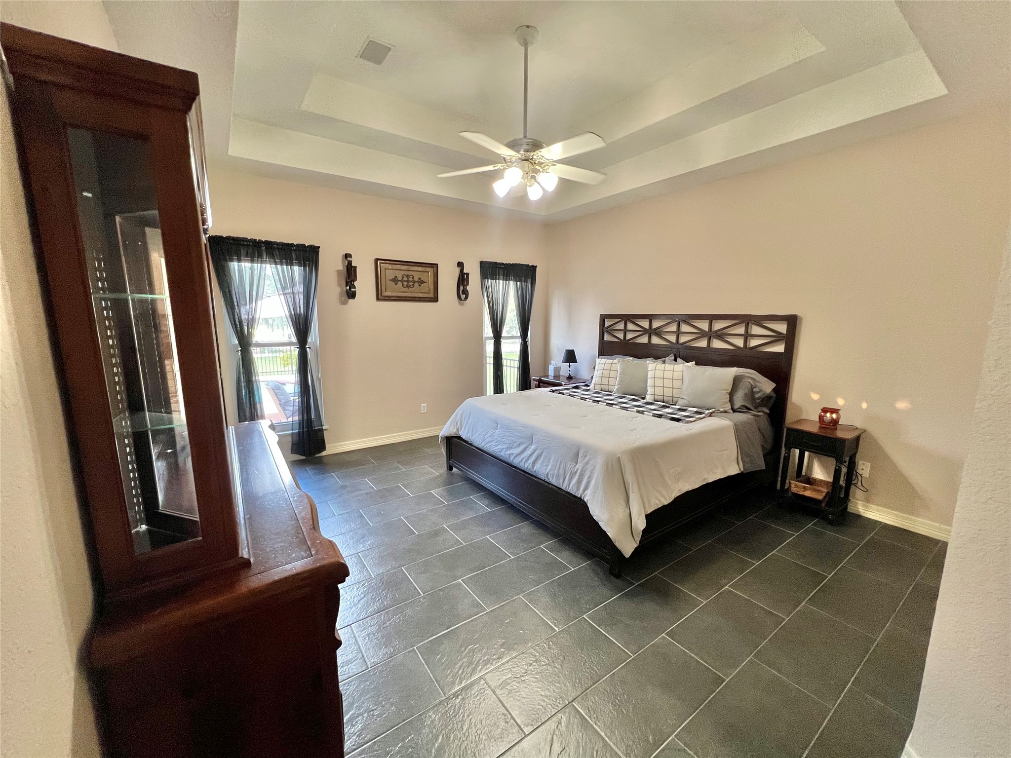 150 Cornelia Lane Angleton, TX 77515 - Photo 26 of 45 a bedroom with a bed and a mirror