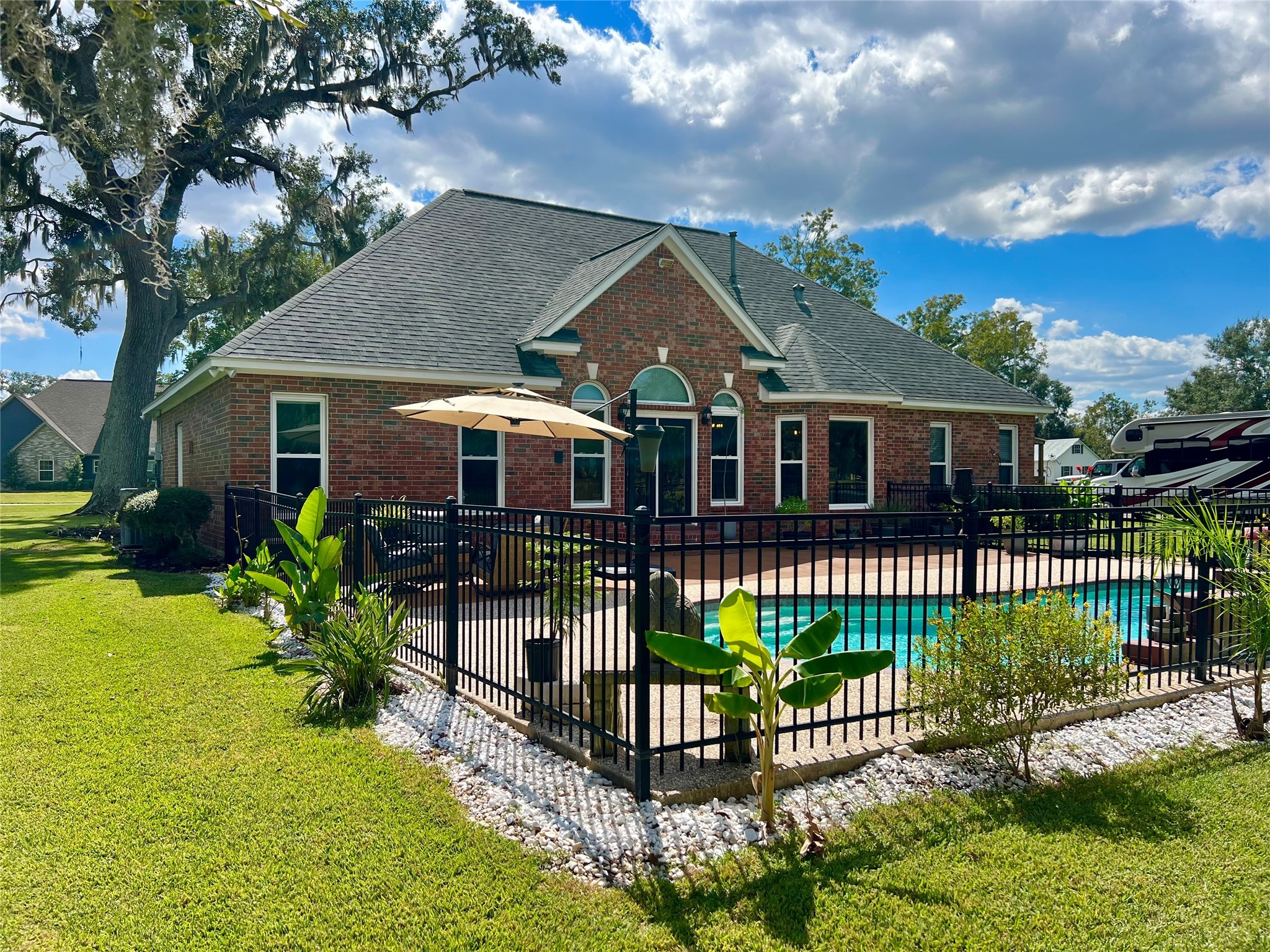 150 Cornelia Lane Angleton, TX 77515 - Photo 41 of 45 a house view with a garden space