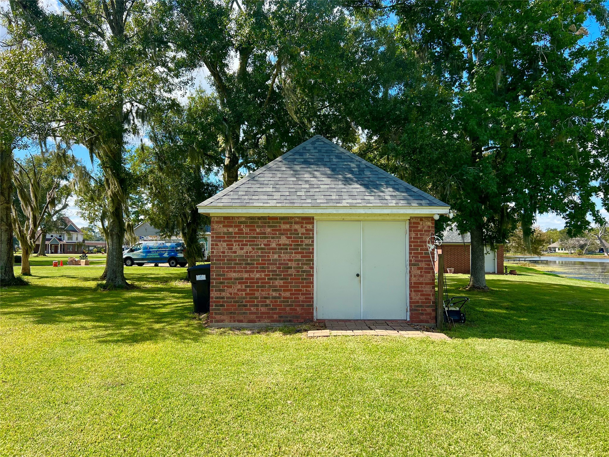 150 Cornelia Lane Angleton, TX 77515 - Photo 45 of 45 a backyard of a house with plants and tree
