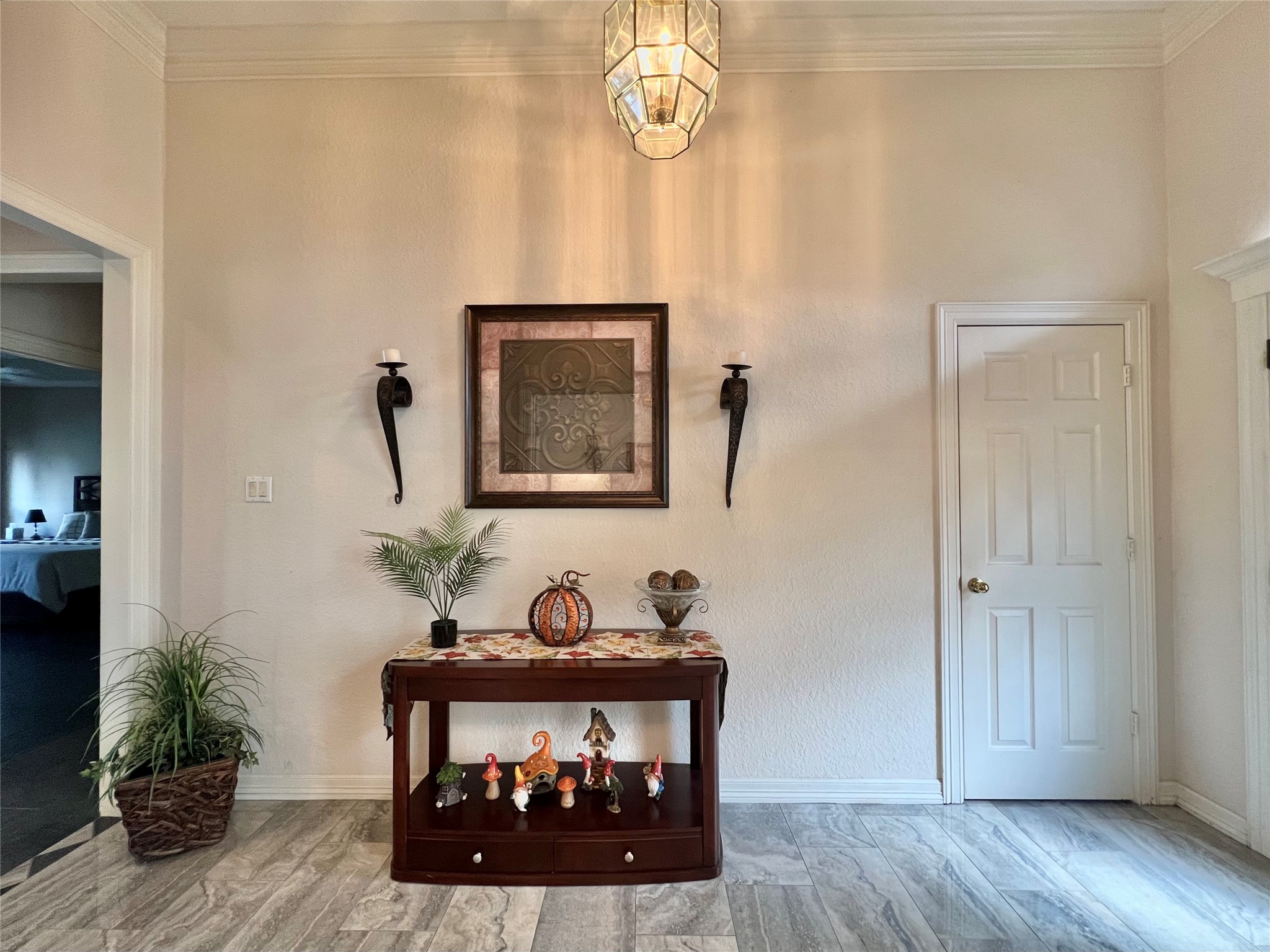 150 Cornelia Lane Angleton, TX 77515 - Photo 5 of 45 a room with painting on the wall and a wooden floor