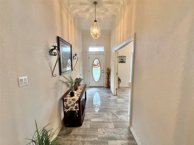 a hall way with furniture