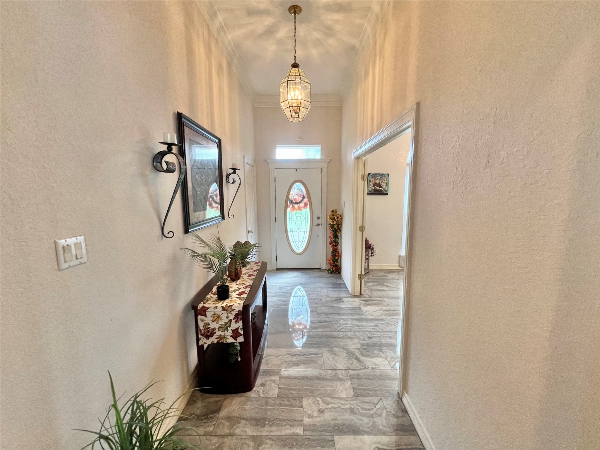 150 Cornelia Lane Angleton, TX 77515 - Photo 6 of 45 a hall way with furniture