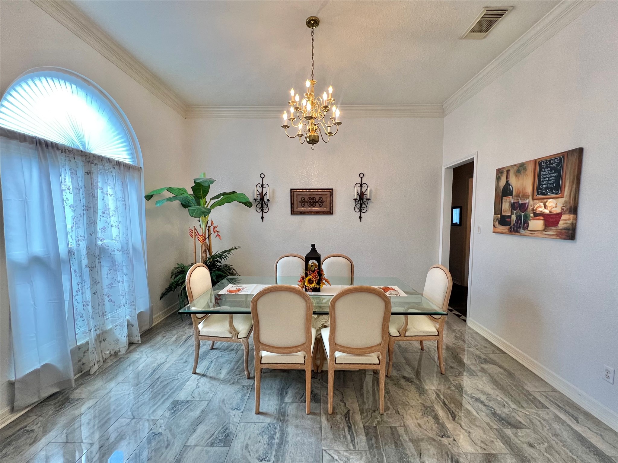 150 Cornelia Lane Angleton, TX 77515 - Photo 7 of 45 a view of a dining room with furniture and chandelier