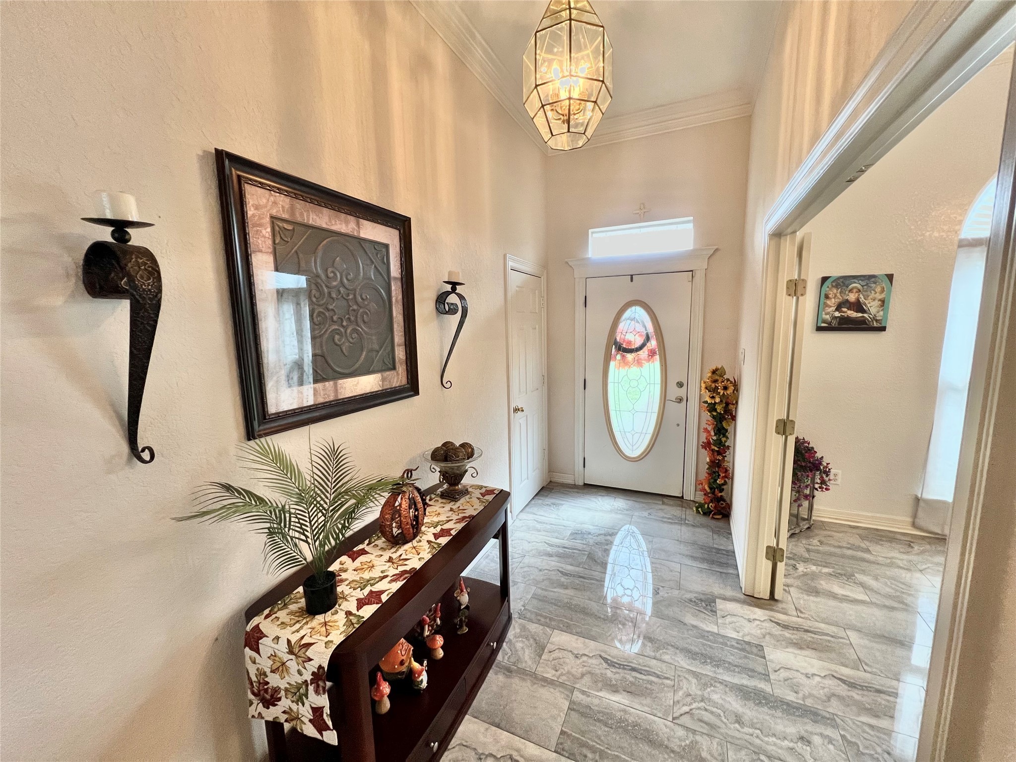 150 Cornelia Lane Angleton, TX 77515 - Photo 9 of 45 a view of a hallway with entryway wooden floor and front door