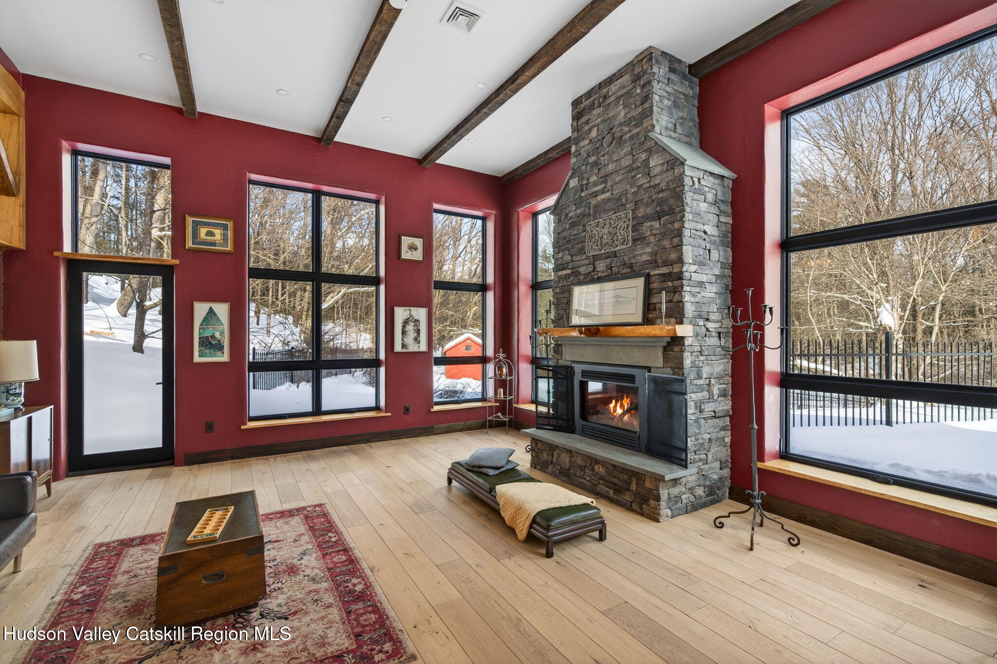 1045 Church Road Saugerties, NY 12477 - Photo 24 of 56 a living room with furniture flat screen tv and floor to ceiling windows