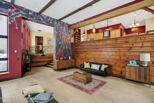 a view of a house with wooden deck