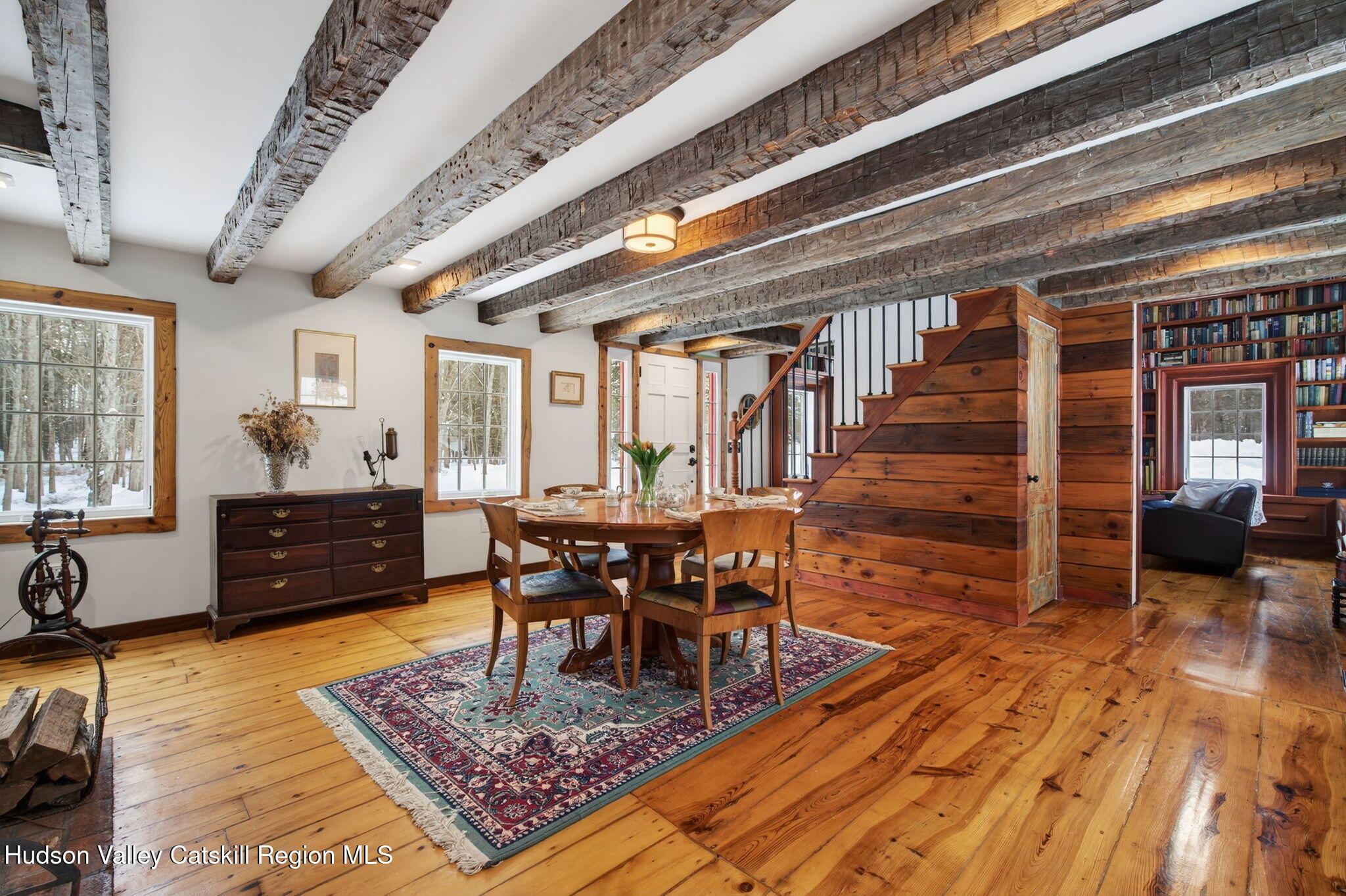 1045 Church Road Saugerties, NY 12477 - Photo 32 of 56 a living room with furniture a rug kitchen view and a large window