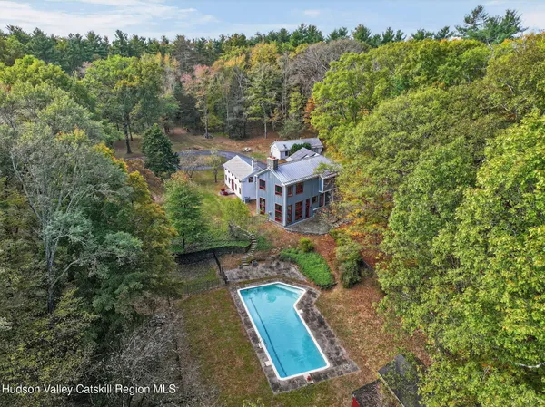 an aerial view of a house with garden space sitting space and garden view