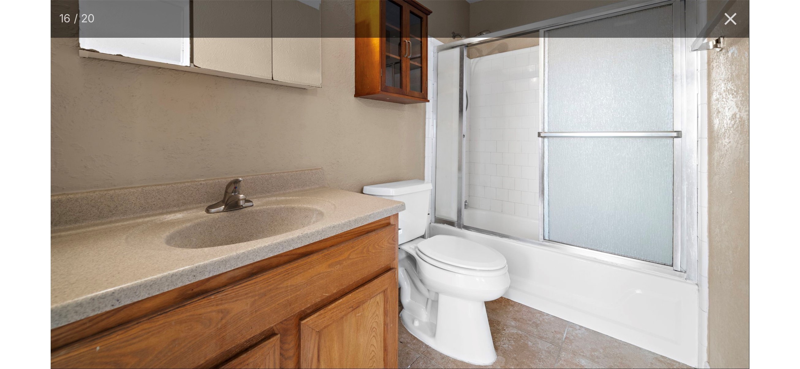 12755 Mill Ridge Drive, Unit 202 Cypress, TX 77429 - Photo 11 of 17 a bathroom with a sink and a toilet