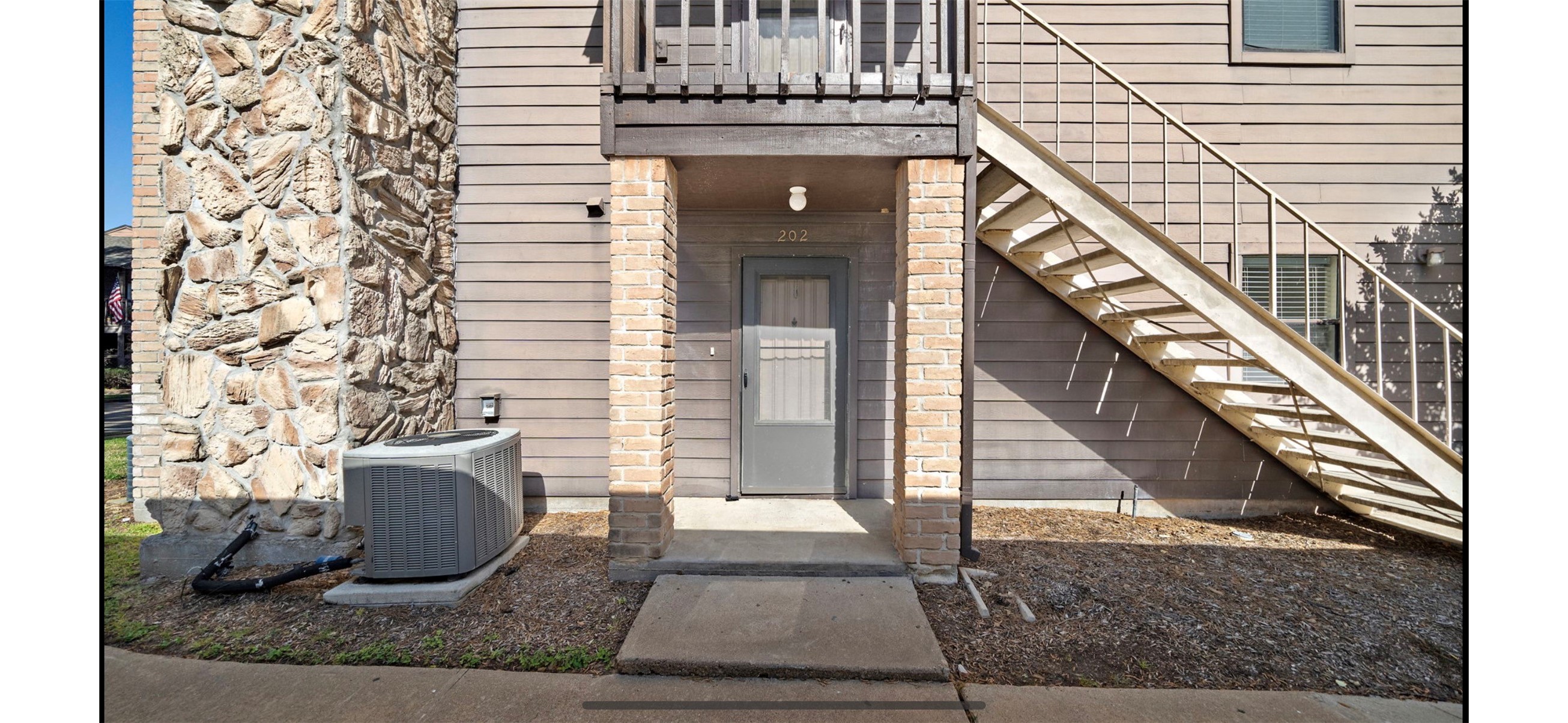 12755 Mill Ridge Drive, Unit 202 Cypress, TX 77429 - Photo 12 of 17 a view of a entryway of the house