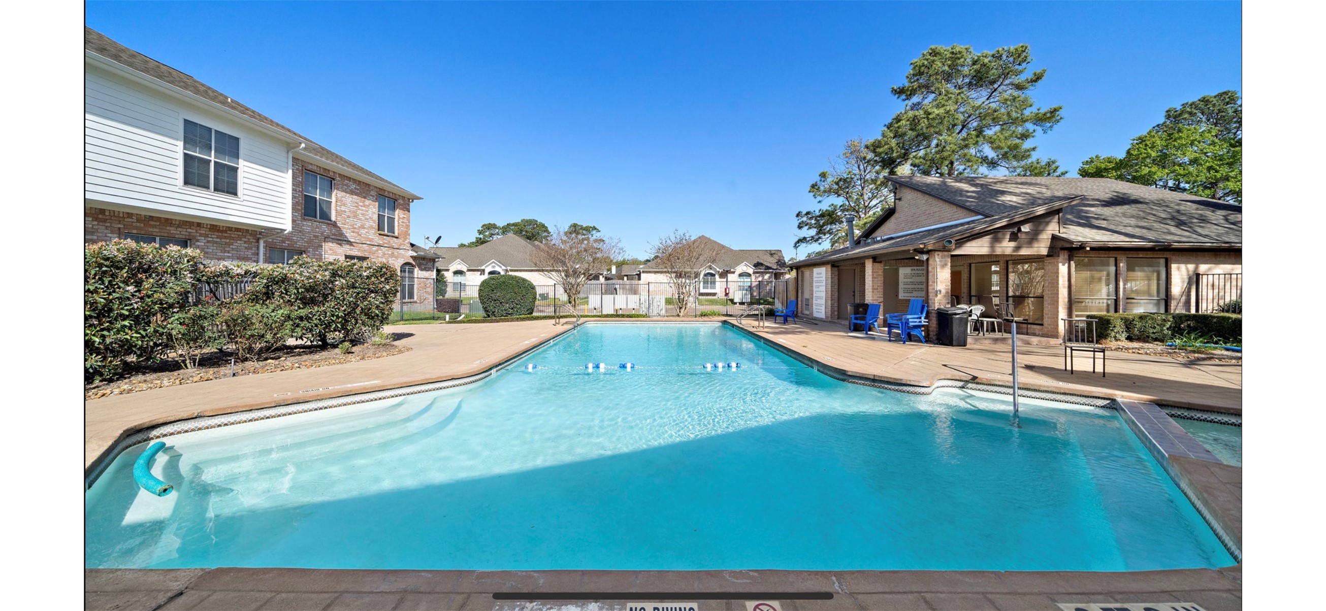 12755 Mill Ridge Drive, Unit 202 Cypress, TX 77429 - Photo 15 of 17 a view of a house with swimming pool