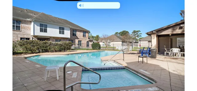 a view of a house with swimming pool