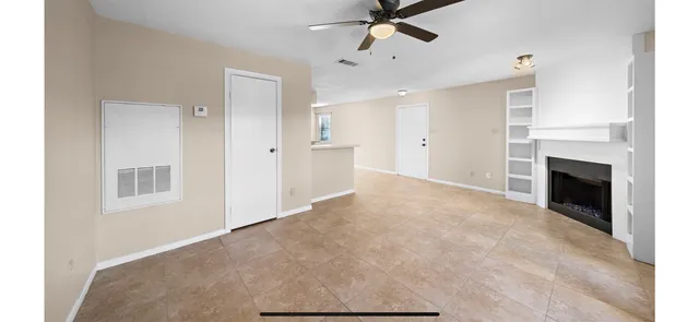 a view of a hallway to a bedroom