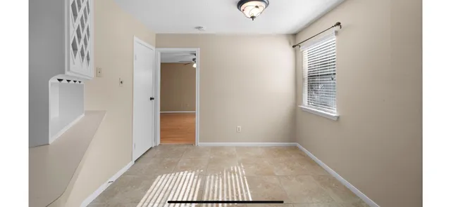 a bathroom with a mirror