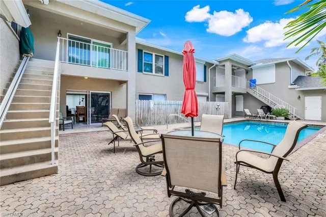 a view of house with outdoor seating space