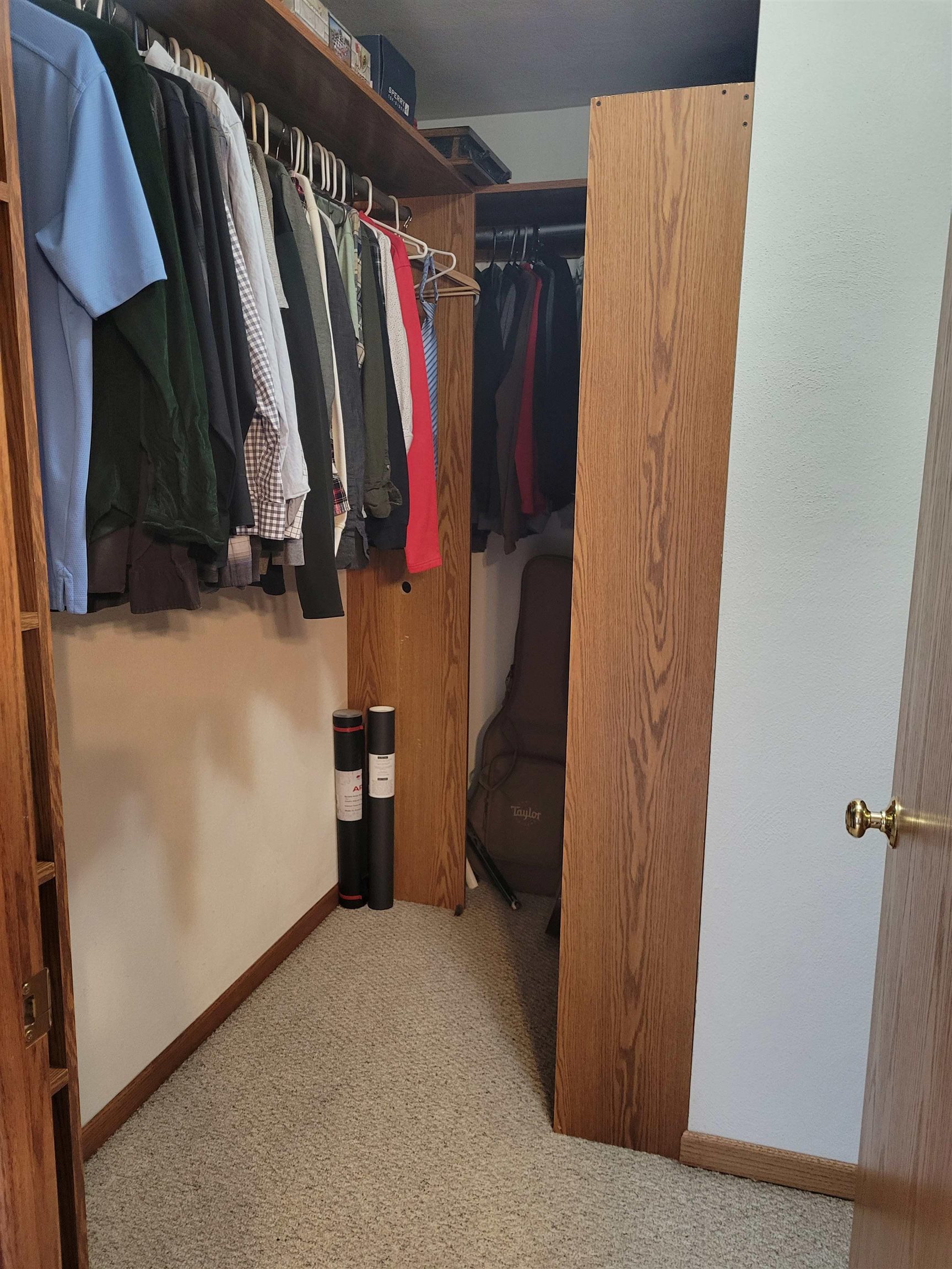 1126 Old Hunter Run Byron, IL 61010 - Photo 15 of 24 a view of walk in closet with clothes