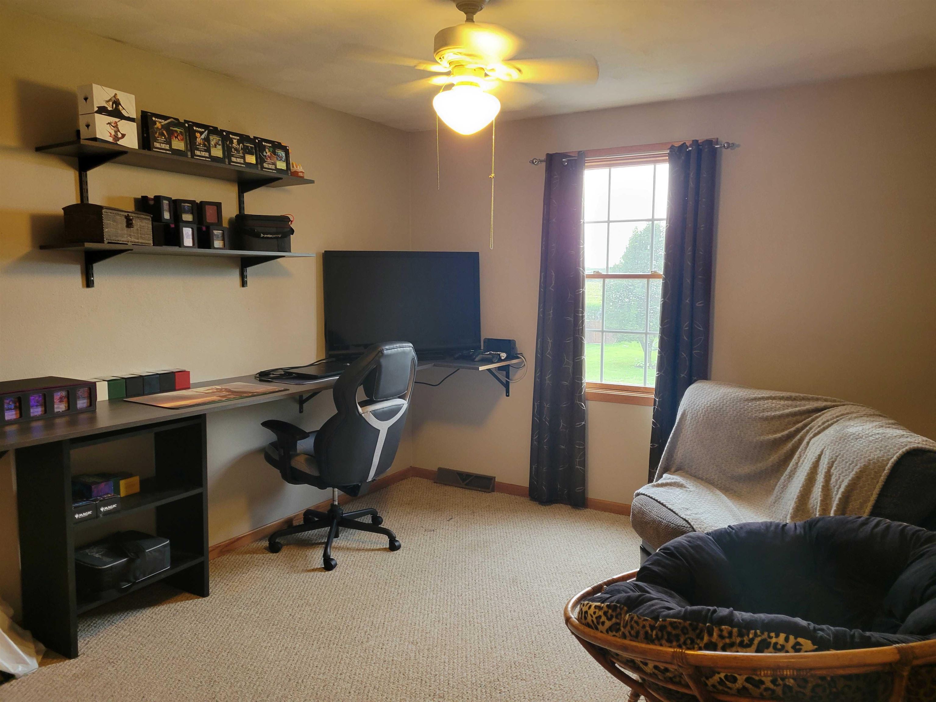 1126 Old Hunter Run Byron, IL 61010 - Photo 17 of 24 a work room with furniture and a window