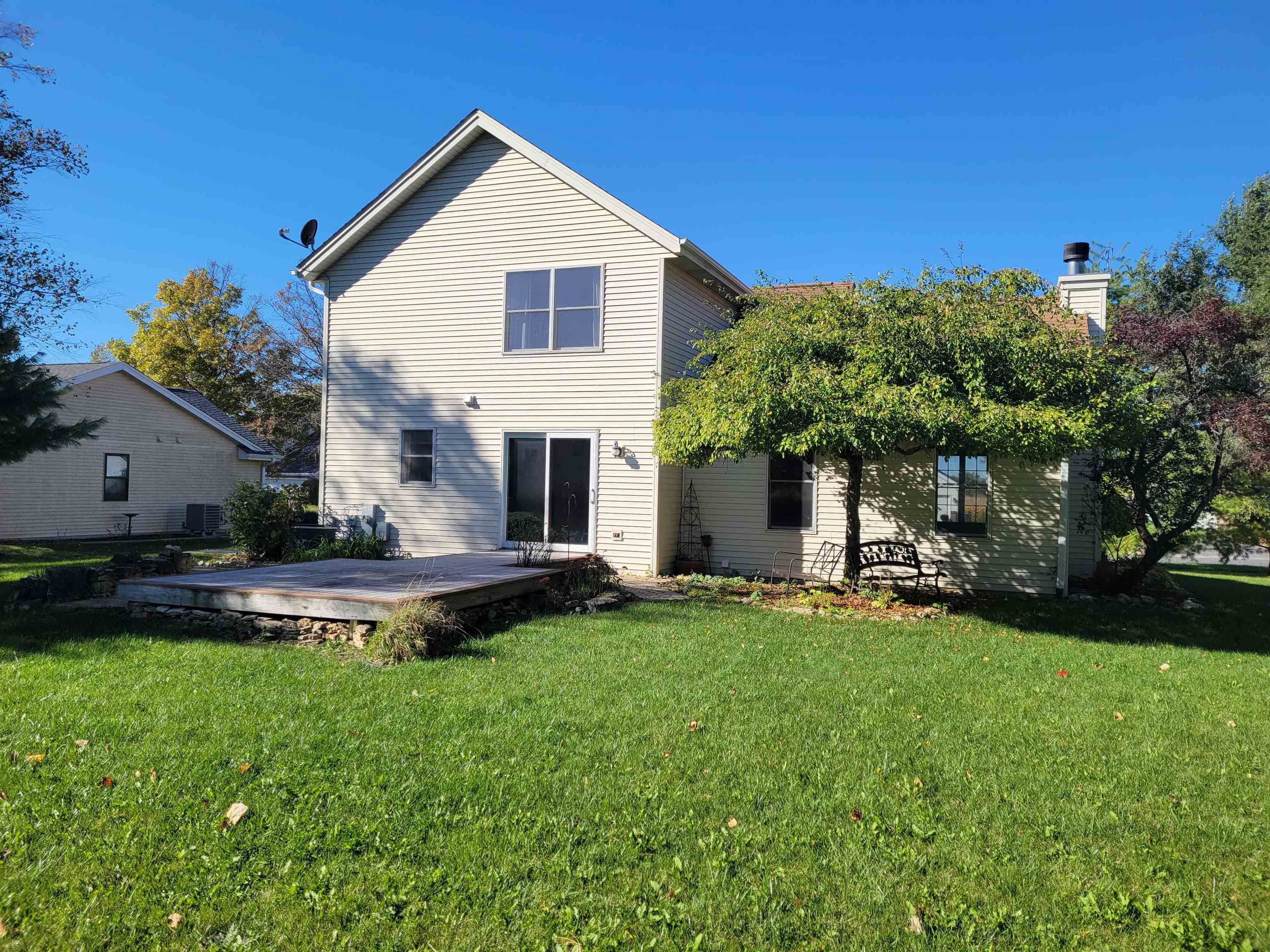1126 Old Hunter Run Byron, IL 61010 - Photo 24 of 24 a view of a house with a yard and sitting area