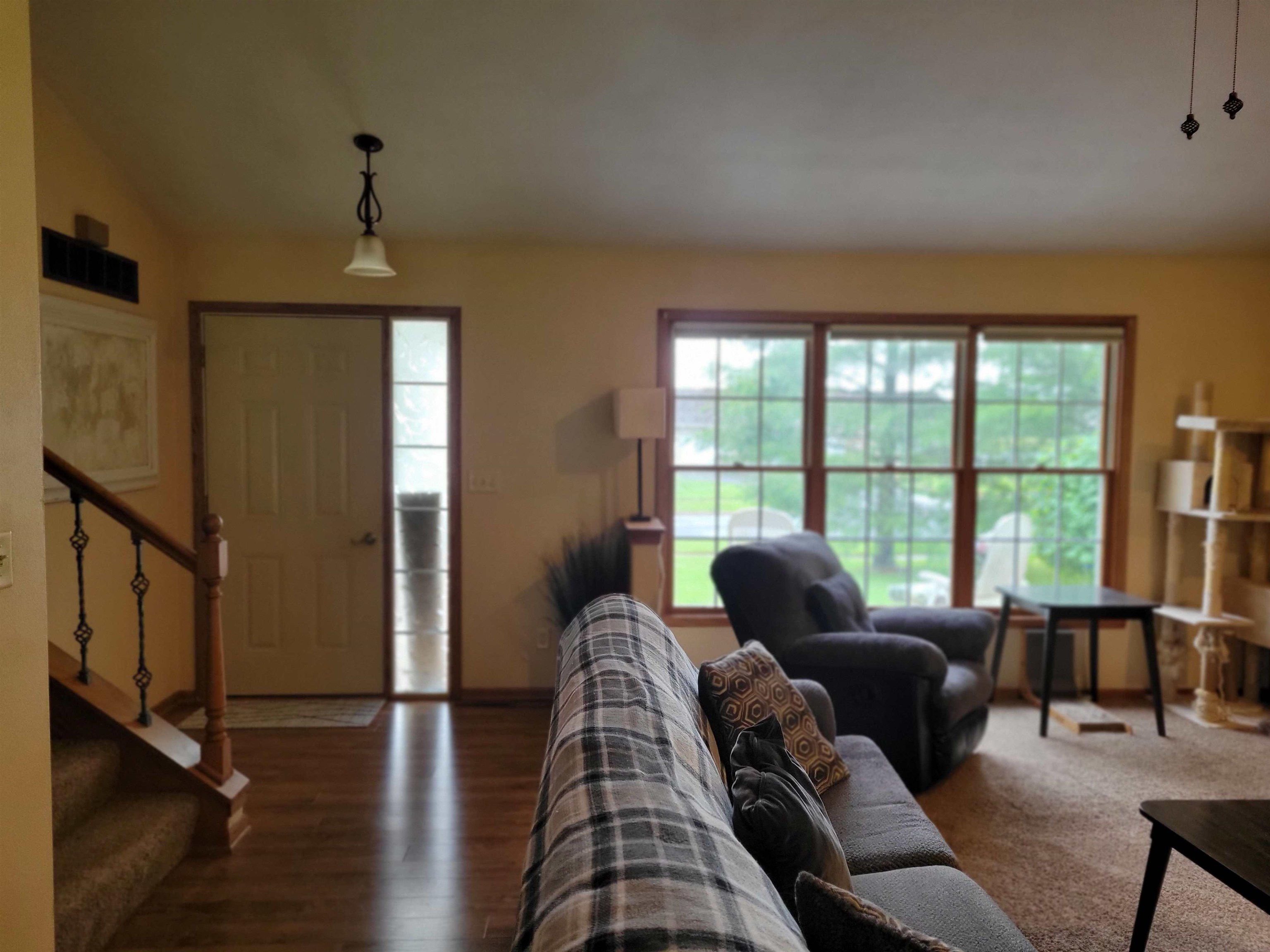 1126 Old Hunter Run Byron, IL 61010 - Photo 4 of 24 a living room with furniture and a window