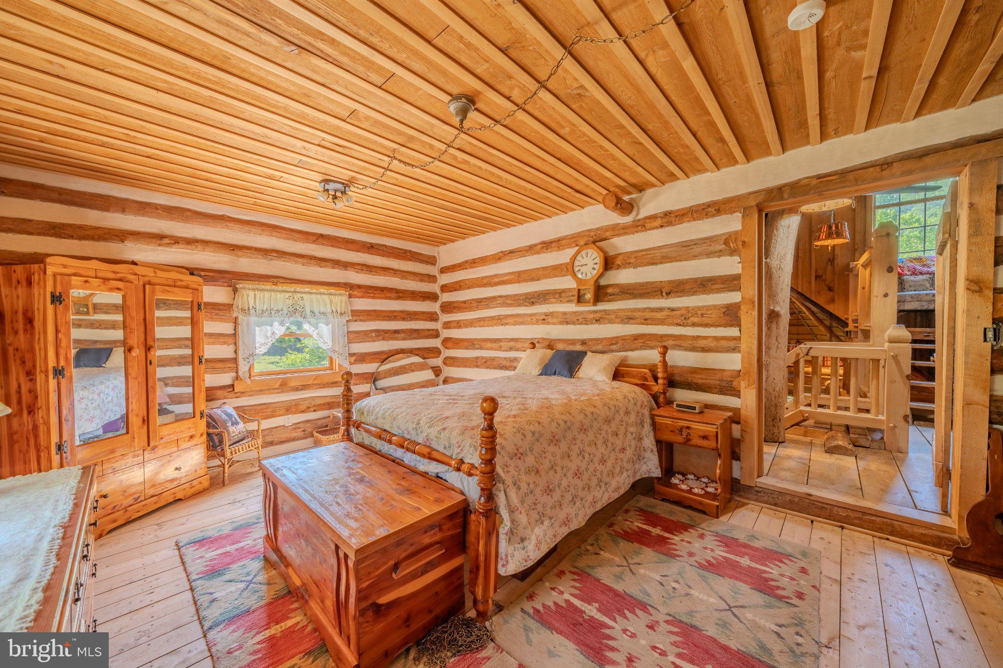 1520 Lingle Valley Road Milroy, PA 17063 - Photo 129 of 144 Cozy log cabin retreat with rustic charm.