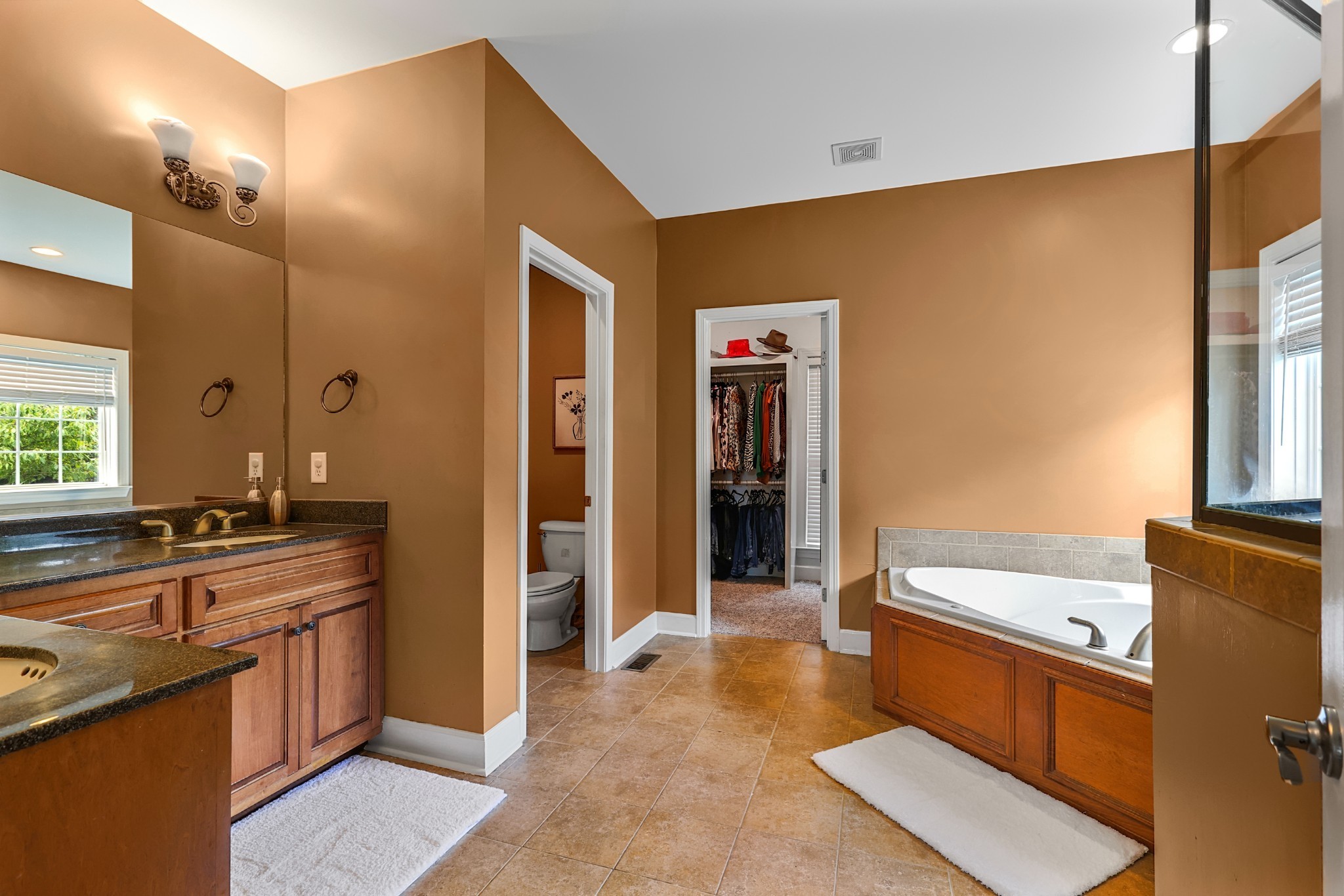 3161 Appian Way Spring Hill, TN 37174 - Photo 13 of 29 a spacious bathroom with a tub sink shower and mirror